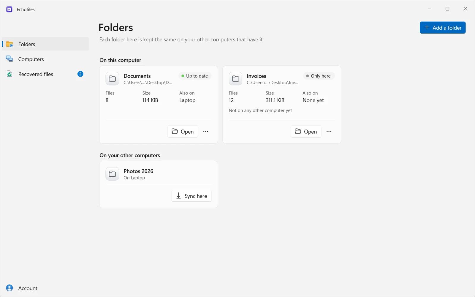 The Echofiles Folders page: Documents and Invoices on this computer, and Photos 2026 on a laptop, ready to sync here